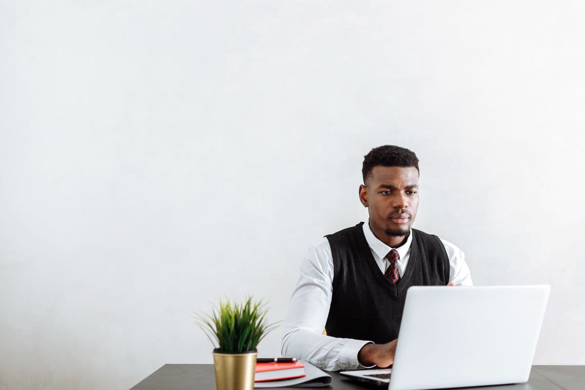 Professional using laptop for digital security setup